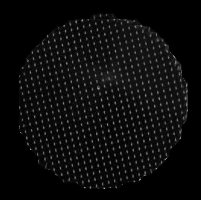 This mask is made of a gadolinium plate with 250 µm diameter holes in a 1 mm square array.
