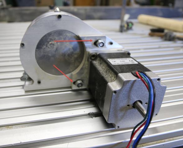 Figure 7 - A-Axis Motor Mounting Bolts Carefully align the chuck with the motor drive shaft and hand tighten.