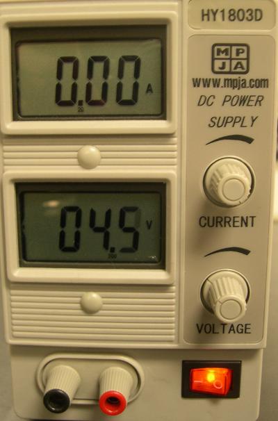 2. Ohm s Law Figure 2.2: DC power supply Figure 2.3: Digital multimeter To use the multimeter as a voltmeter, the dial selector is set to one of the positions labeled V.