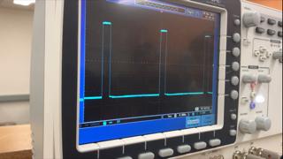 Figure 8: PWM wave generated by Arduino as shown on the oscilloscope. The PWM wave is approximately set to a 25% duty cycle.