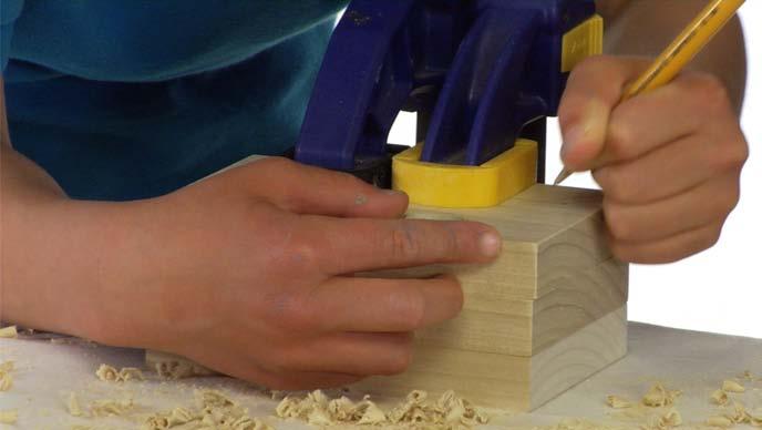 TIP As long as the boards are stacked and firmly clamped, you can drill the two
