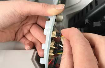 5. Turn the Keypad/Circuit Board over and unplug the 4-pin connector (that holds the