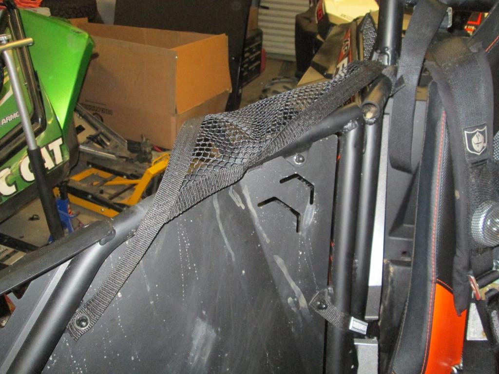 steps for other side REAR DOOR NET INSTALLATION: Place the net over the door like shown on the