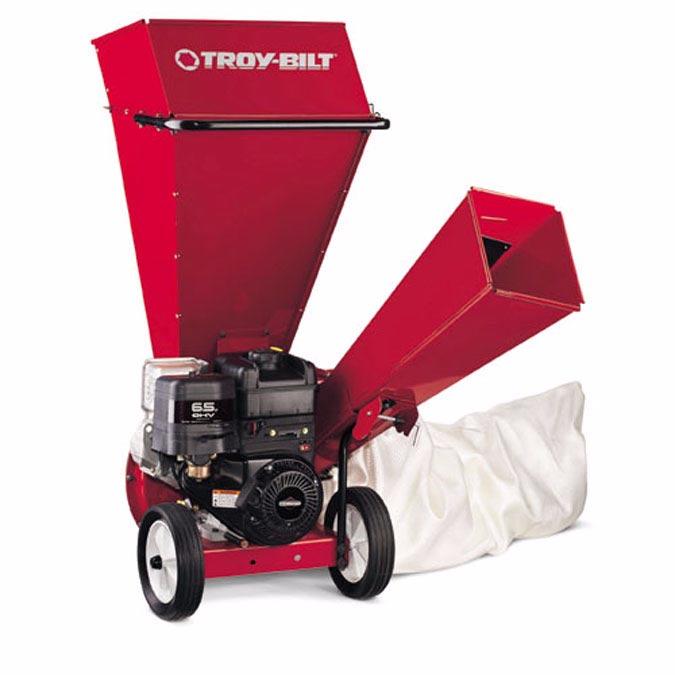 Chipper / Shredder Servicing Troy-Bilt Models CS4210 and CS4265 MODEL CS4265 SHOWN 1.3. Remove the two wing knobs on either side of the discharge chute and pivot the discharge chute upward.