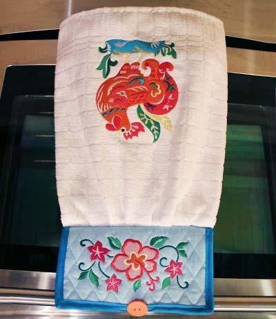 Not only does the cheerful topper and button make this an ingenious dish towel solution, but eye-catching embroidery mean it's a