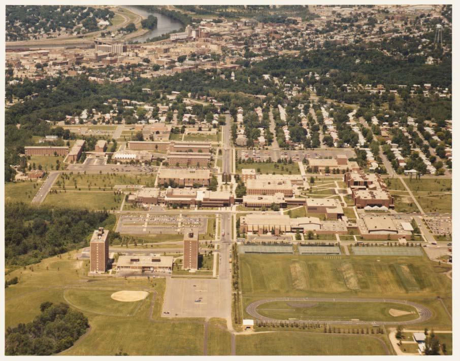 What We Learned - General In-house and Out-sourced digitization BOTH take significant time Aerial view of Highland Campus at Mankato State University, 1980 Important to add into unit