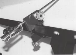 ATTACHING THE OVERHEAD CLAMPING ARMS You are furnished with two sizes of clamping lips, determine which size is appropriate for the reel you are grinding. Normally the smaller size is used.