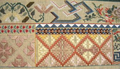 design characteristics of all these cultures including the oblong shape as well as the pattern bands worked in a variety of stitches.
