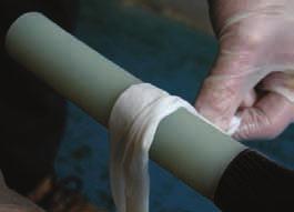 Clean and degrease the insulation with an approved solvent wipe to remove all traces of any remaining loose material.