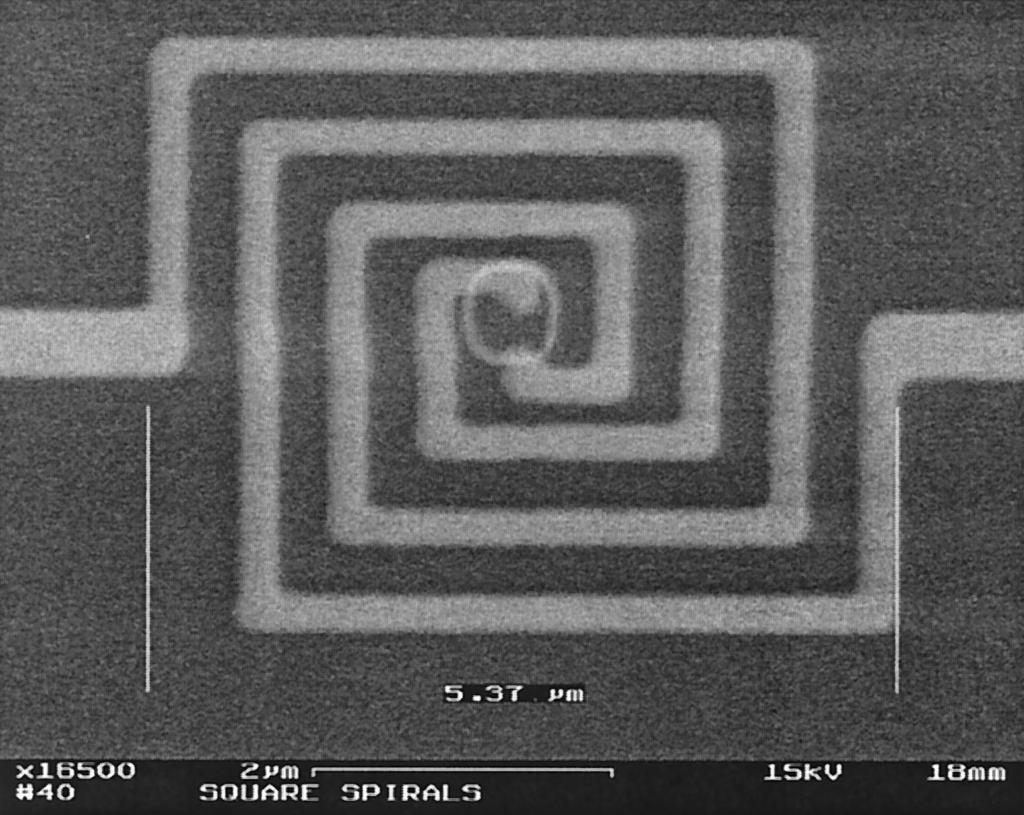 Fig. 2. FZPL in the transmissive configuration coupled to an antenna-coupled microbolometer. Fig. 1. Electron-microscope photograph of the optical spiral antenna used in this study.