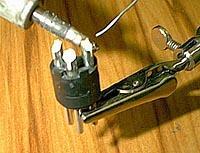 To tin a wire, apply the tip of your iron to the wire for a second or two, then apply the solder to the wire.