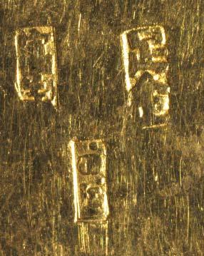 Figure 5. Chinese marks on reverse of gold case (detail). the back (fig. 5).