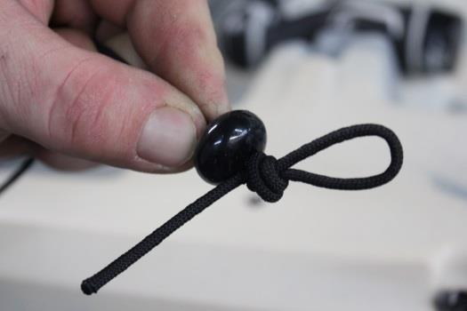 over-hand knot, forming a loop.
