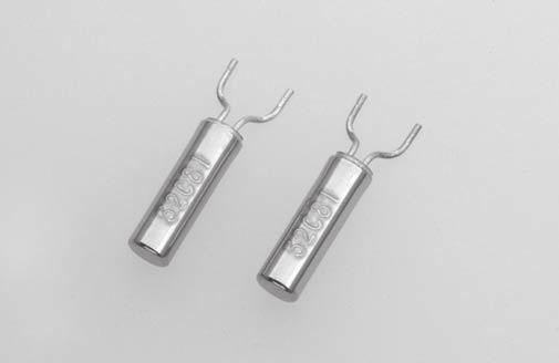 TUNING FORK CRYSTAL UNITS (SMD Cylinder Type) CMR200T 2000pcs/reel FEATURES 7Lead formed SMD type with embossed tape. Automatic mounting and reflowable type.