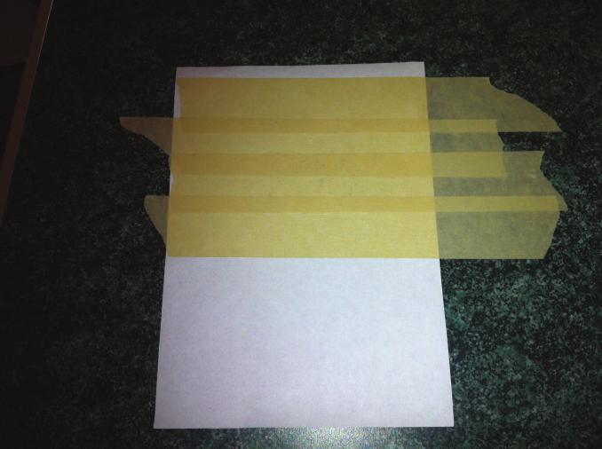 Start by cutting the strip away on the right hand side.