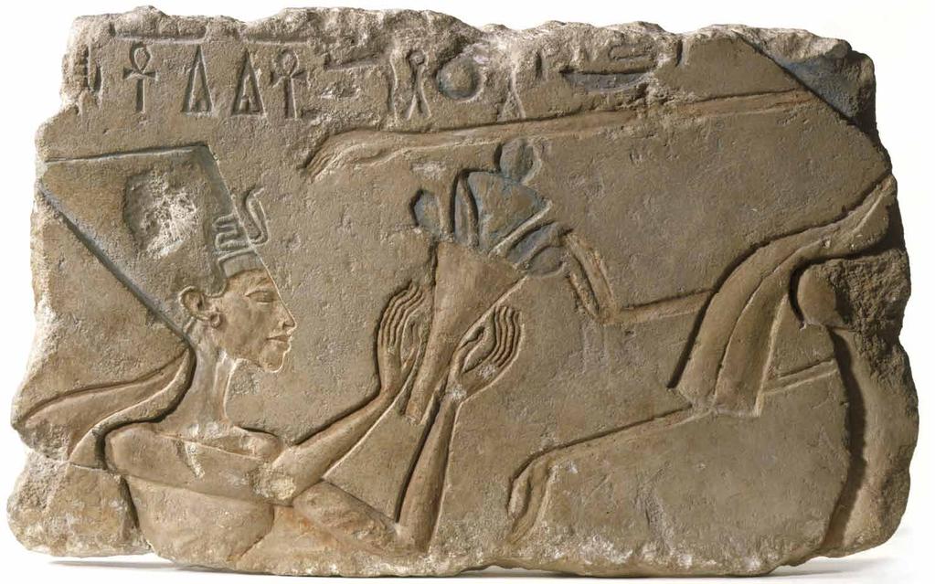 Description of the Artwork This curved slab of limestone carved and painted with figures and hieroglyphics is a fragment of a larger scene.