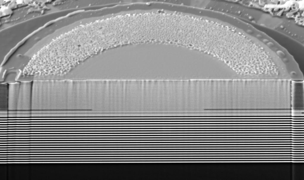Chapter 6. VCSEL Fabrication Oxide aperture 10 µm Fig. 6.1. SEM micrograph of an oxide aperture (indicated) in a FIB VCSEL cross-section. 6.5 High-Speed VCSEL Fabrication Process Before processing, the 3" wafer is cleaved into 8 10 mm chips.