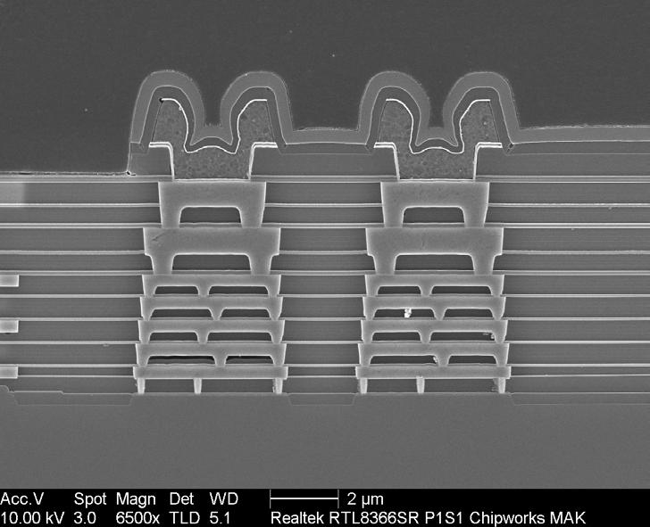 Process 3-1 3 Process 3.1 Overview Figure 3.1.1 shows a cross-section SEM view of the. The device is fabricated using seven levels of copper interconnect plus an aluminum top level and bond pad metal.