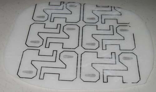 This was my pattern. Now place it face down on a fresh polymorph sheet and run over it quickly with the iron.