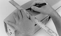Use a ruler to measure rearward approximately 5-1/4" from the firewall and make a mark on the fuselage with a pencil.