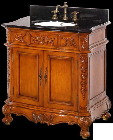 TM An elegant smaller size antique vanity with two large front doors and hand carved details on top of the cabinet doors, corners and legs adds
