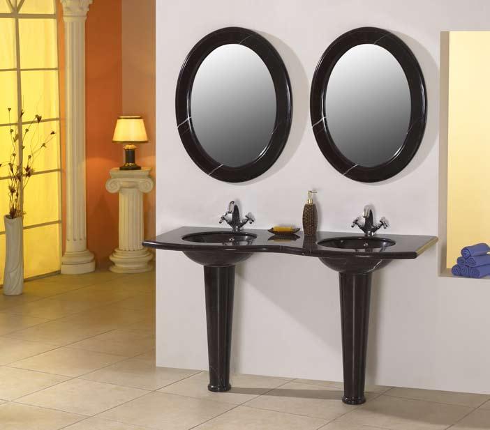 TM Artistic hand-carved stone double sink vanity adds beauty and function to your bathroom. Two under mount vessel sinks with overflows are attached to the polished countertop.