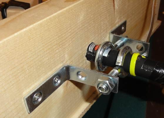 Laser Lock/Adjustment 1 ½ corner braces ( L brackets) #4 ½ wood screws ½ threaded eye bolts with nuts Screwdriver Pliers Drill 1.