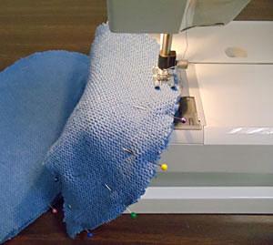 Sew around the sweater pieces, leaving the top of the