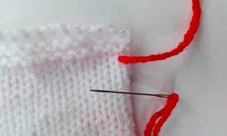 Duplicate Stitch Decoration Cut a length of contrast colour yarn