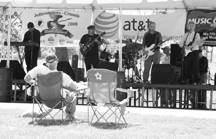 Jim s band was a good band to get the crowd into the music and to draw some onlookers from the other areas to see who was playing.