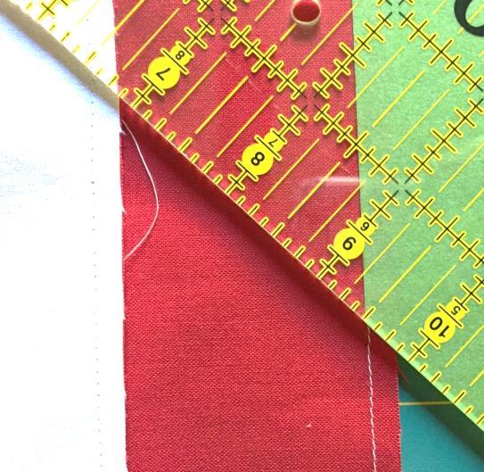 pressing crrectly and that yu are using a scant ¼-inch seam when assembling the rws. Cut acrss the tp edges f the ruler.