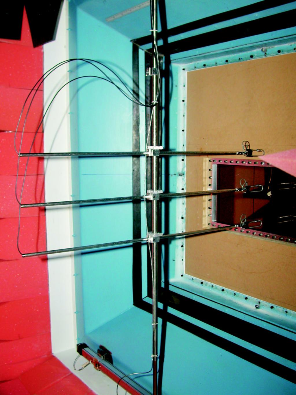 x 4 (1.41 m). A plexiglas test panel is shown installed in the SALT Facility in Figure 2. The plexiglas panels are clamped between two.