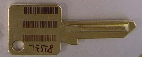 Metal engraving on security door keys GENERAL IND. The request was to identify the metal door keys by engraving a human readable code and optionally a barcode on the key body.