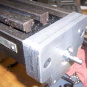 fit. 10. Rotate lead screw to pull bearing plate towards end of mill table.