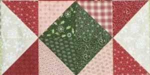 Sew a 7½" neutral print square to each side of