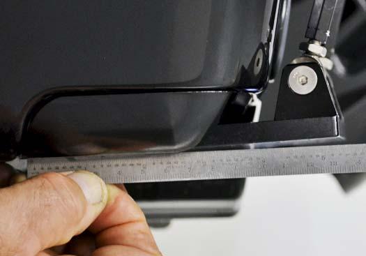 Use forward fixed area of trim tab as neutral reference when adjusting angle of trim tabs.