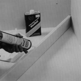 Figure 19.3.2.L DuPont does not recommend that wall cladding be adhered to backsplashes or countertops using Joint Adhesive.