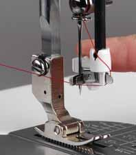 Operating your GrandQuilter Needle threader To make threading the needle easier and quicker you have been provided with a needle threader. 1. Lower the presser foot.