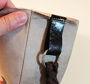 short ends. Center the end of each strap along the sides of the outer shell.
