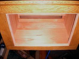 With the inside of the cabinet finished, it was time to start replacing the top.