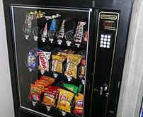 7.4 Vending Machine Example Assuming the keypad produces a 4-bit numeric output, add logic to produce the release signals for each
