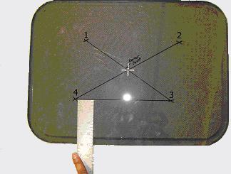 3) Draw a horizontal line from point 3 to point 4. This line will be used to square the plastic template to the base (Photo 5). 5) Using a high speed electric drill and a.193 Dia.