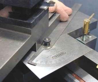 Setting the Cutting Tool Even though the compound rest is set at an angle to the work piece, the thread cutting tool must be set square to the work piece. A center gage makes this setting possible.