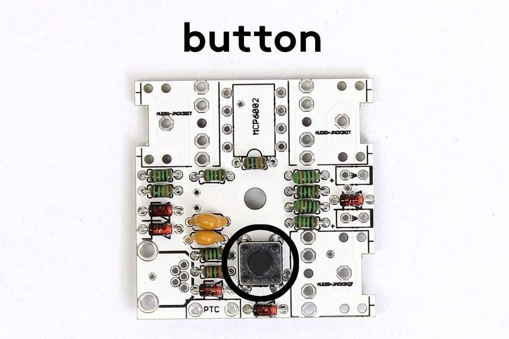 BUTTON Push the small button down to the PCB and