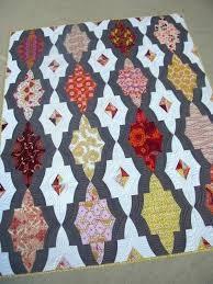 Once learned, this pattern adapts beautifully to any size from a king sized quilt to a placemat.