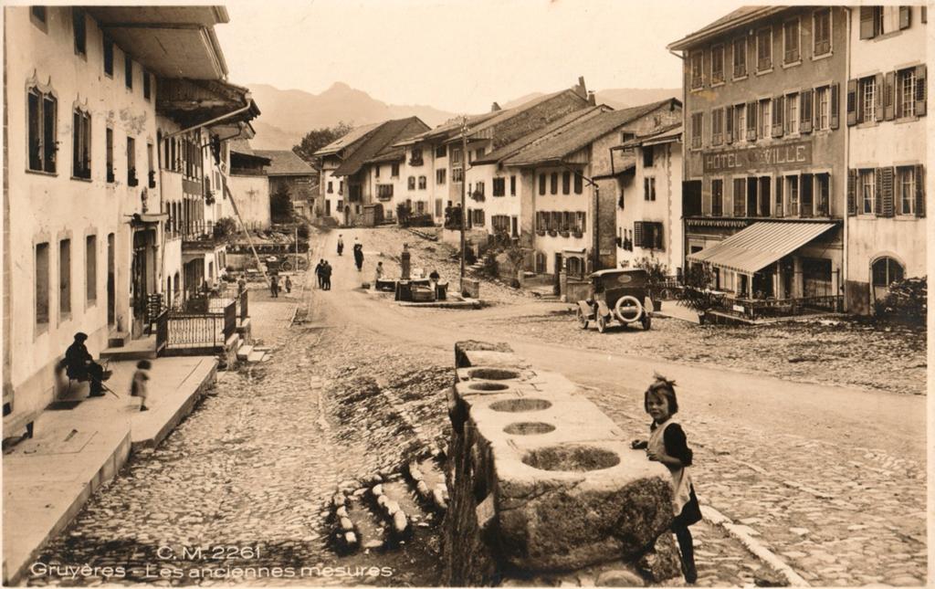 In a similar vein and demonstrating the continuity of the trade, the post card, shown below, illustrates the town of Gruyères in Switzerland where ancient