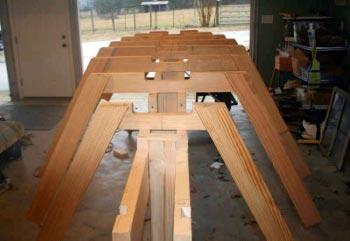 The frames are then assembled to the strongback jig and temporarily attached in-place.
