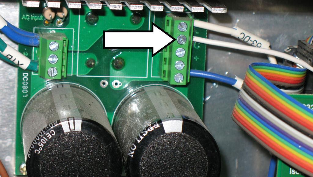 Loosen the terminal screw directly under the existing power supply (white wire).