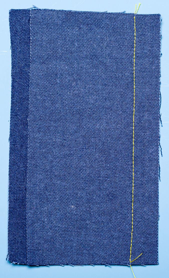 Stitch along the 5/8-inch seam line. Stitching may begin and end with backstitching (stitch forward a few stitches, then backward, then forward to the end).