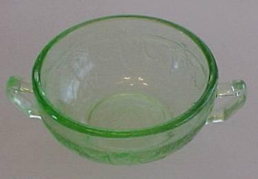 High Remarks: This is a 2 handle bowl from childs set which includes 4 Bowls and a Small round flat tray. May see this as individual item sold as a salt.